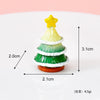 A small yellow star Christmas tree charm made of resin with green and white layers.