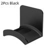 A black universal wall-mounted headphone holder and hanger.