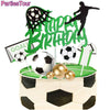 A soccer ball cake topper set featuring a green birthday message and a soccer ball design on a cake base.