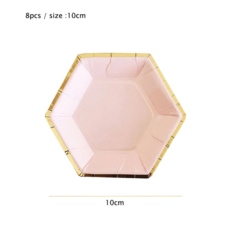 A pink disposable party plate with a gold rim, shown flat.