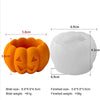 Orange silicone mold with a pumpkin design next to a white silicone mold.