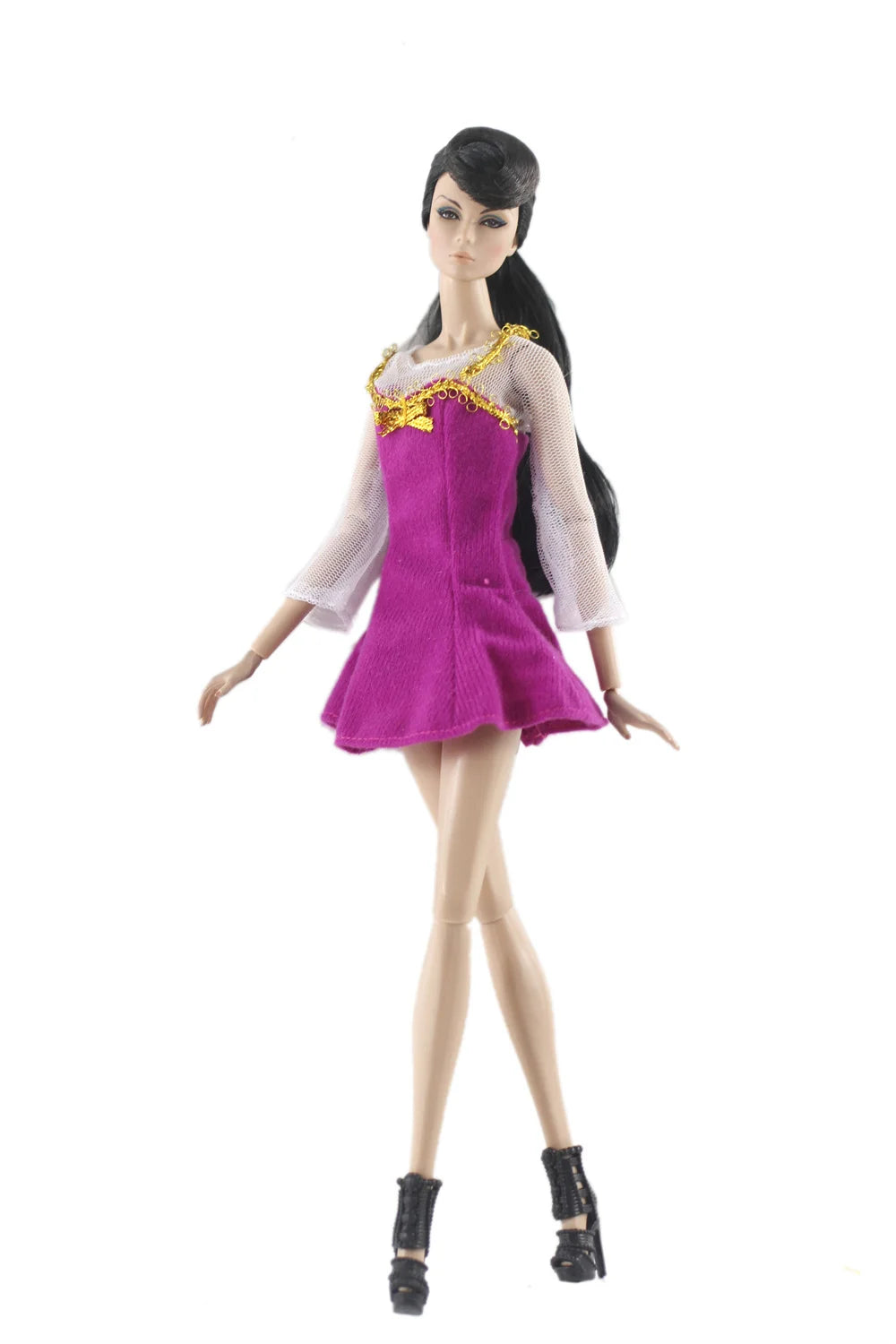 A handmade doll dress gown featuring a purple bodice, sheer sleeves, and gold trim on a 11.5-inch doll.