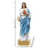 A white and blue statue of the Blessed Mother Mary with a golden halo and crown.