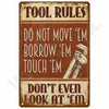 A vintage metal sign with distressed orange-brown background and white text listing tool rules such as do not move or borrow 