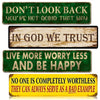 A collection of five vintage metal signs with inspirational text on green, brown, and yellow backgrounds.