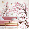 Pink cherry blossom tree wall stickers featuring branches and pink flowers on a white background