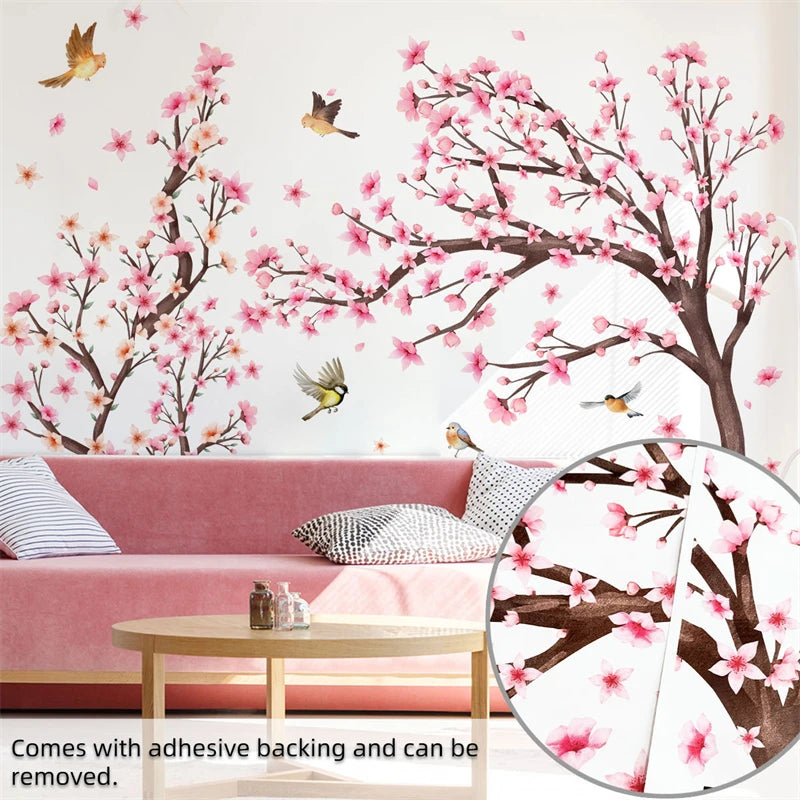 Pink cherry blossom tree wall stickers featuring branches and pink flowers on a white background
