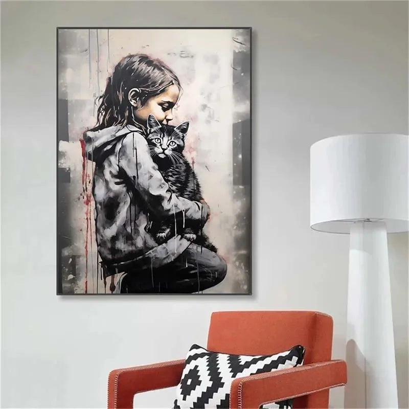 Wall art featuring a portrait of a girl hugging a black cat in a Banksy style, rendered in grayscale and black ink.