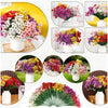 A collection of artificial violet flowers in various colors like pink purple yellow and red arranged in bouquets.