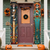 A vibrant Day of the Dead porch banner featuring a Mexican skull and floral motifs on a wooden door.