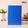 A vertical blue PVC photo corner protector with a geometric pattern, next to white flowers.