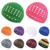 A collection of handmade crochet beanie hats in various colors including green, pink, orange, purple, white, and gray.