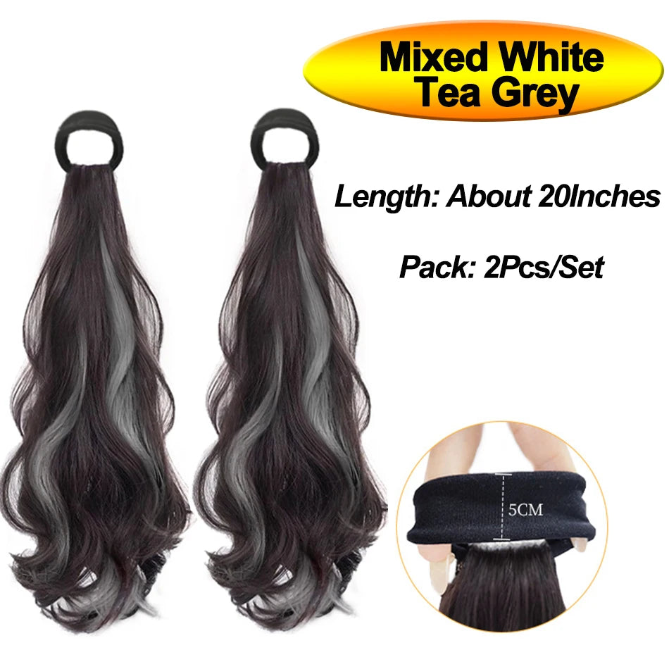 A pair of mixed white tea grey hair extensions with loops, about 20 inches long.