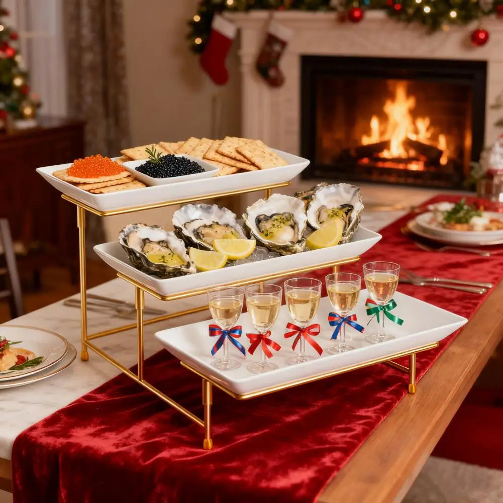 Elegant three-tier serving rack displaying seafood appetizers on a wooden table.