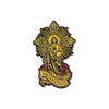 Gold enamel pin featuring a depiction of Saint Judas Tadeo with a radiant halo and surrounding rays.