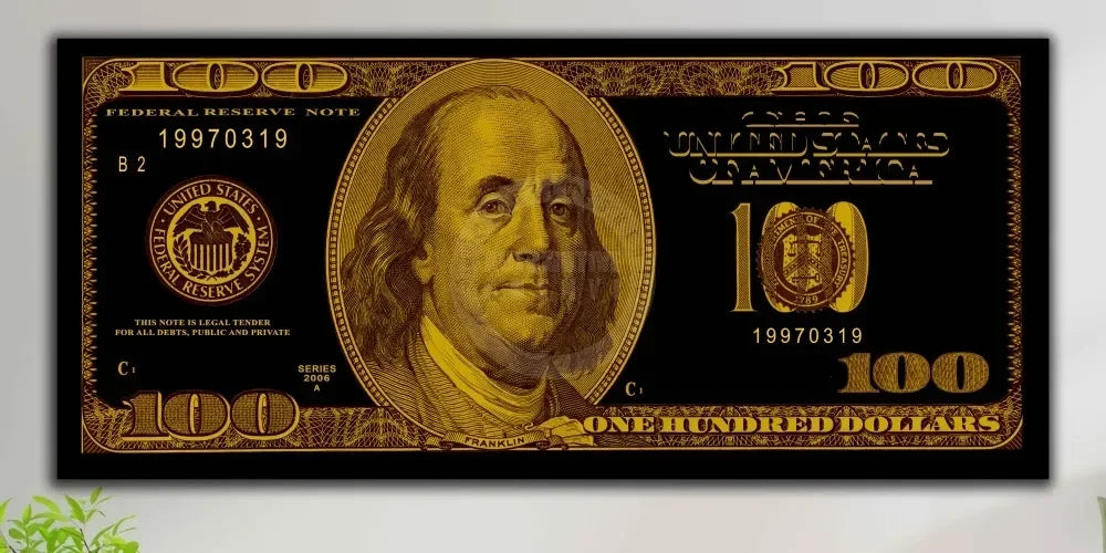A close-up of a Federal Reserve Note, specifically a $100 bill from 1997, printed on black and gold paper.
