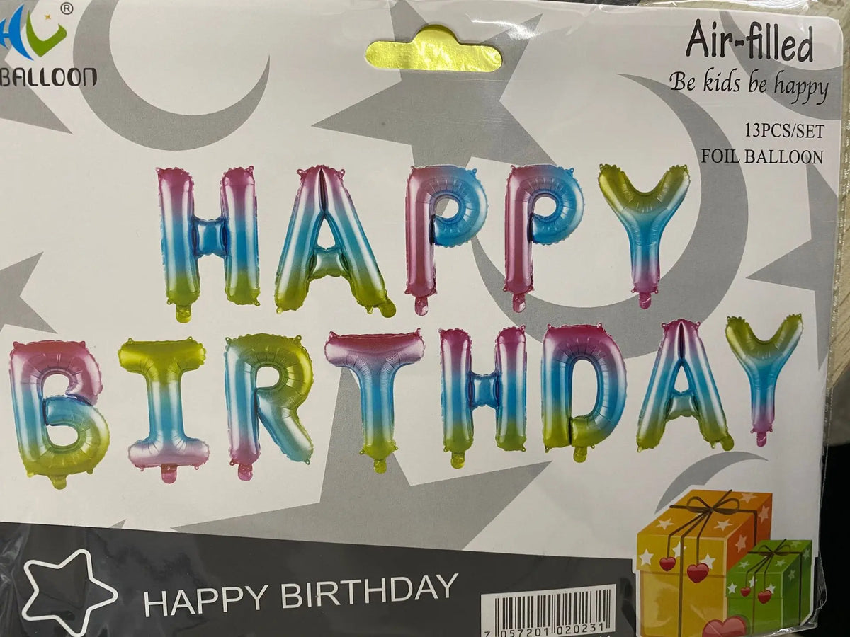 A set of iridescent foil balloons spelling out Happy Birthday in various colors.
