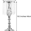 A tall, ornate crystal vase with dangling beads and a wide base.