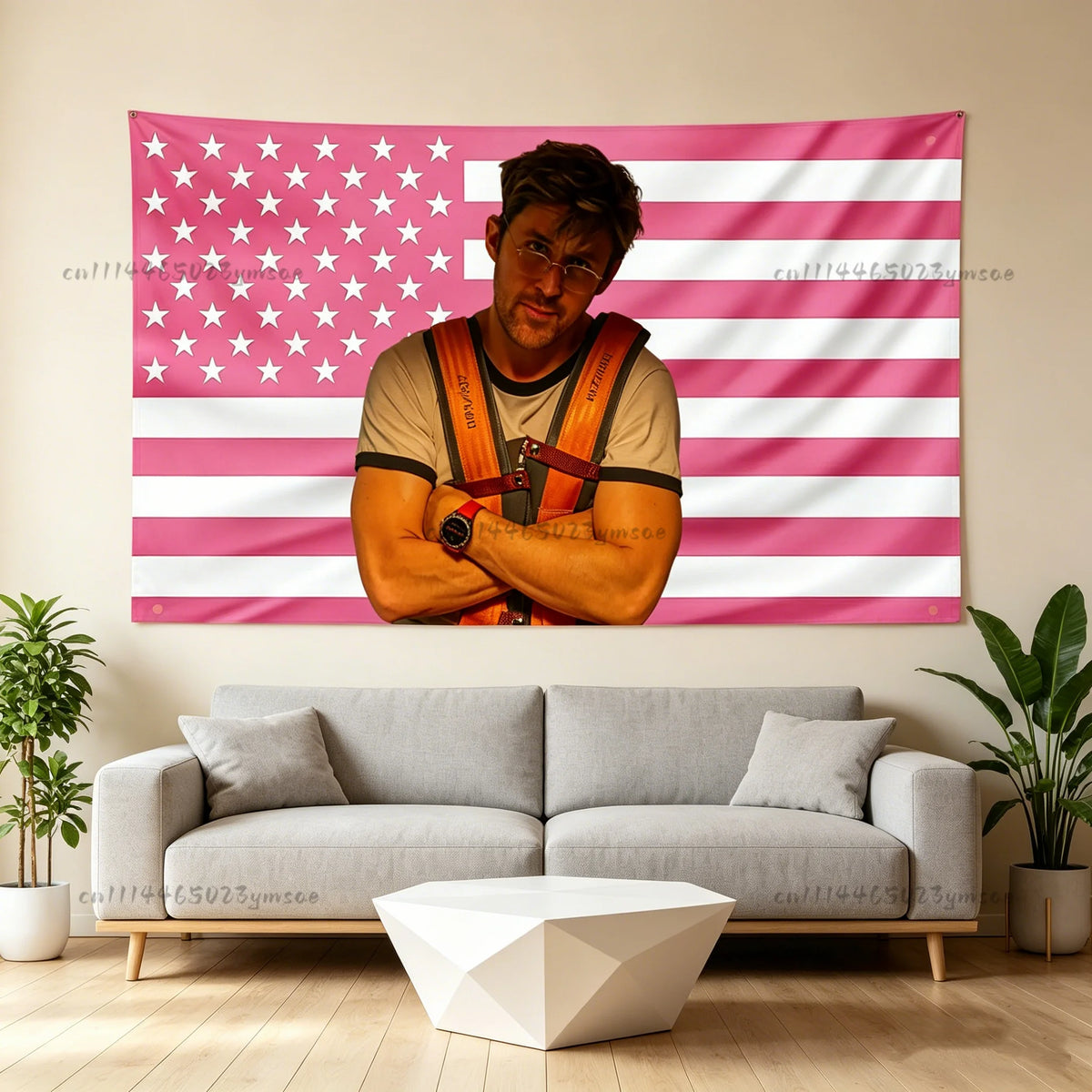 A person wearing a striped shirt poses in front of a pink and white American flag tapestry on a wall.