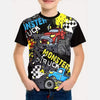 A young boy wearing a black t-shirt with a full graphic print featuring Monster Jam Grave Digger and Monster Truck themes.