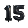 Black foil number balloons spelling out fifteen