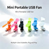 A collection of multi-colored portable USB fan units showing various colors and designs.