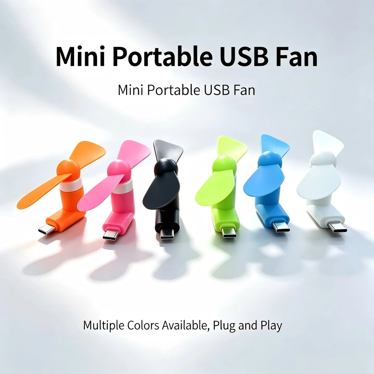 A collection of multi-colored portable USB fan units showing various colors and designs.