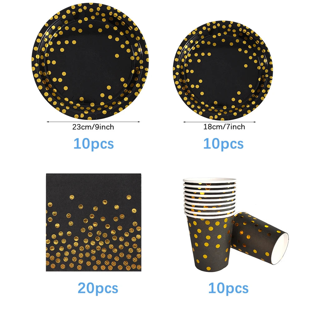 A set of black and gold disposable dinnerware including plates, cups, and napkins.