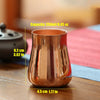 A handcrafted pure copper vintage mug with a tapered shape, showing its dimensions and capacity.