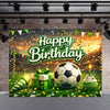 A vibrant soccer field backdrop for a birthday celebration featuring a green football, wrapped gifts, and confetti against a 