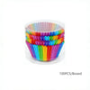 A box of 100 rainbow colored disposable cupcake liners stacked inside a clear plastic container.