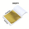 300 pieces of edible gold leaf flakes for baking and cake decoration shown in a white packaging box.