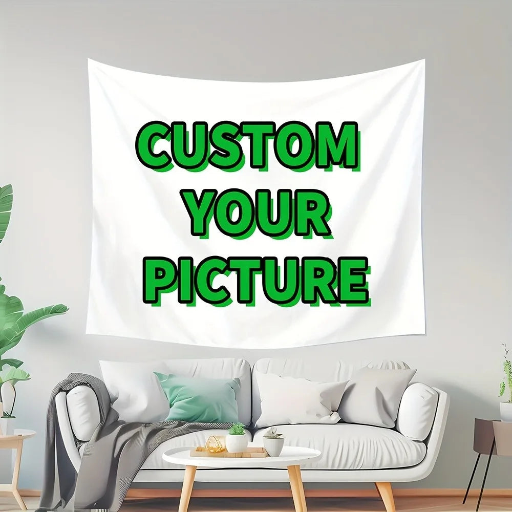 A white tapestry featuring the text Custom Your Picture in green font displayed on a living room wall.
