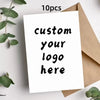 A white greeting card with black text that reads custom your logo here is shown next to a kraft paper envelope.