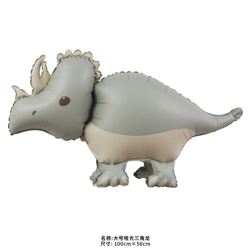 A gray dinosaur decoration kit featuring a standing dinosaur figure with a banner and balloons.