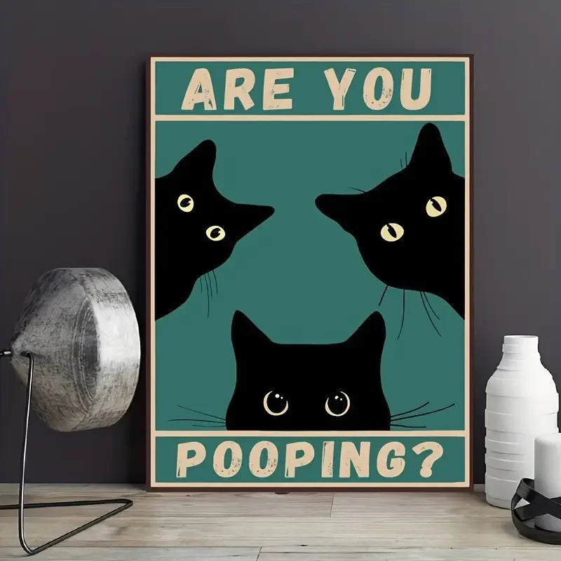 A poster featuring a black cat silhouette and the text Are You Pooping?