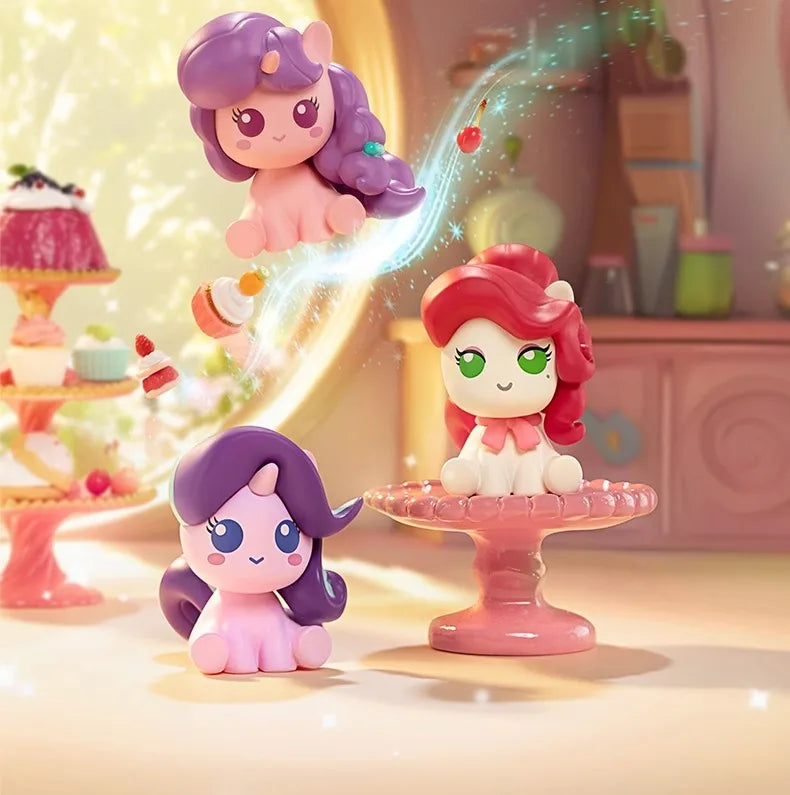 A pink and purple My Little Pony Magic Bottle collectible figurine with a translucent magic bottle effect.