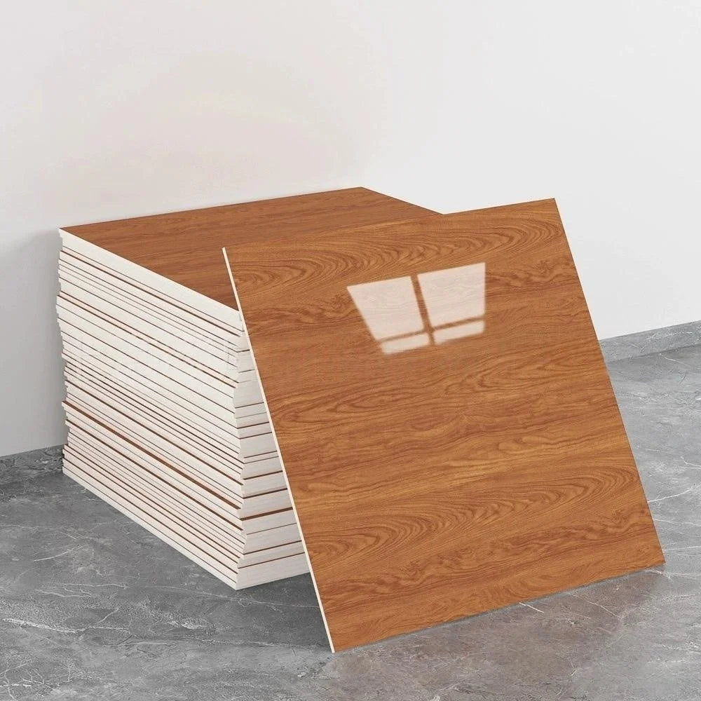 A stack of self-adhesive marble tile stickers is shown next to a single brown wooden tile.