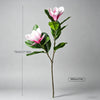A tall artificial magnolia tree with pink and white silk flowers on a slender stem.