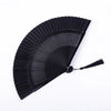 Black traditional Chinese folding fan with a pleated design.
