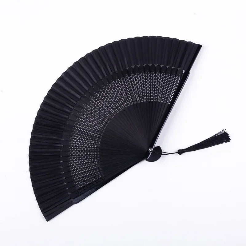 Black traditional Chinese folding fan with a pleated design.