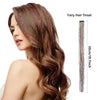 A woman models a long, wavy brown hairstyle adorned with colorful fairy hair tinsel.
