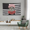 A decorative tapestry featuring a cat with pink fur wearing a red jacket against a black and white striped background.