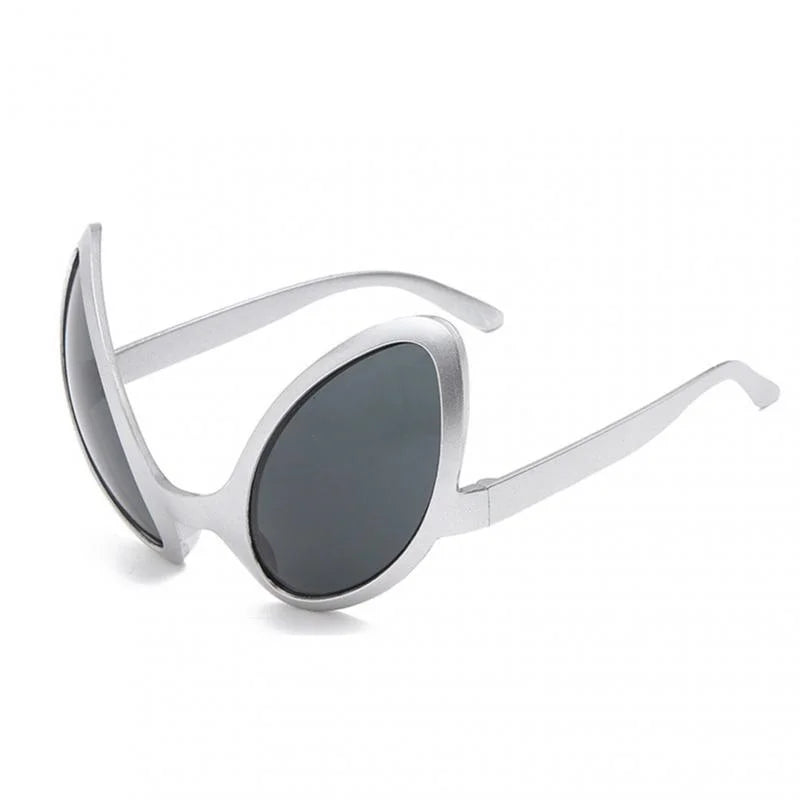 Silver-framed sunglasses with dark gray lenses and a cat-eye shape.