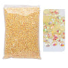 Bag of gold glitter and loose yellow and pink resin rhinestones