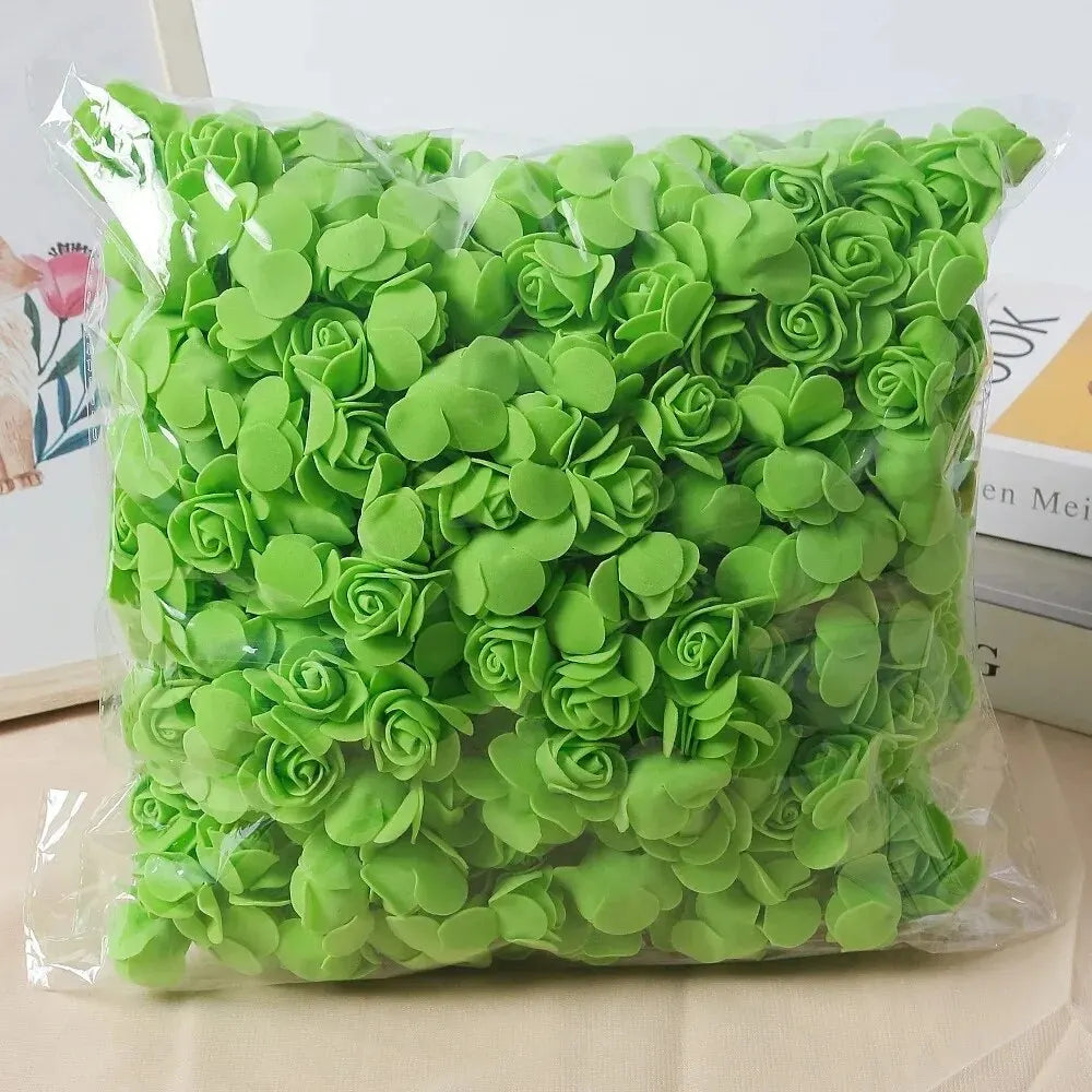 A clear plastic bag filled with bright lime green PE foam artificial rose flowers for DIY decoration