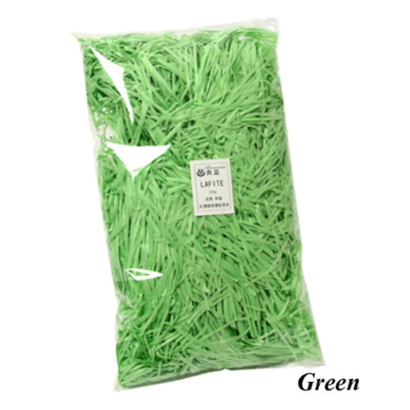Bag of green lafite crinkle paper shreds for gift boxes and party decor