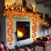 Orange LED string lights shaped like maple leaves decorating a fireplace mantel and window