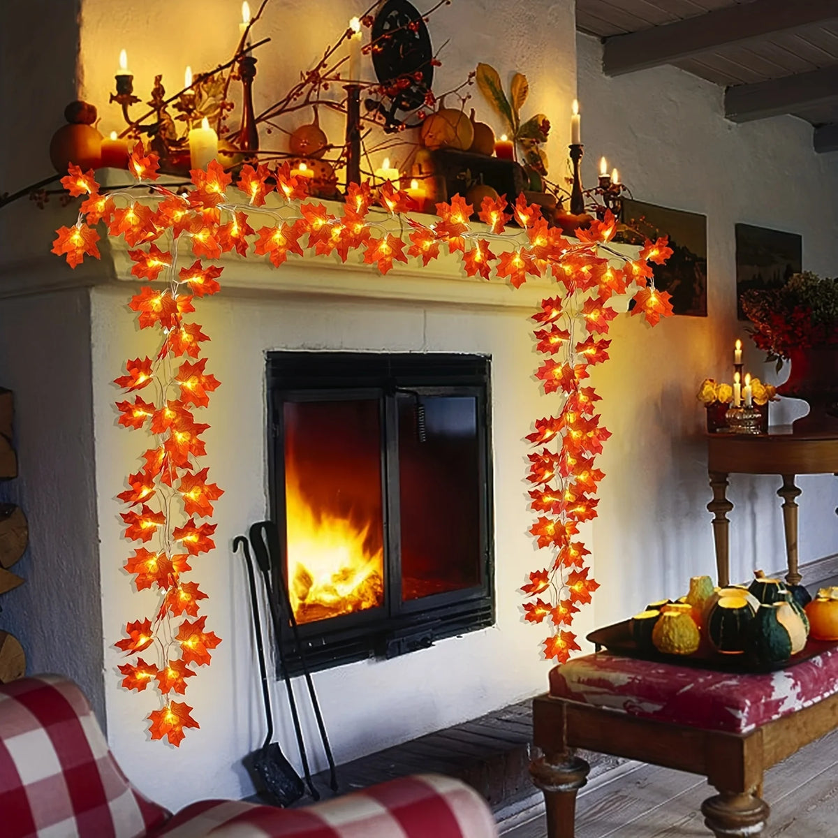 Orange LED string lights shaped like maple leaves decorating a fireplace mantel and window