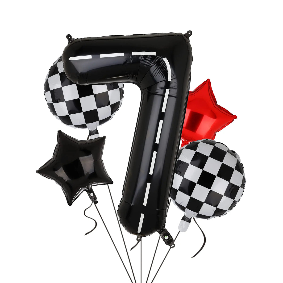 Black foil balloon shaped like the number 7 with a checkered pattern and other party decorations